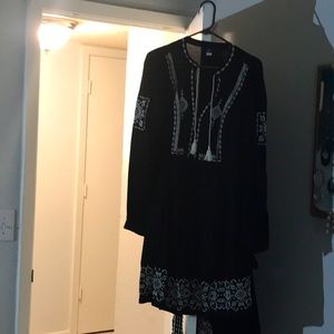 Womens V neck dress with intricate details